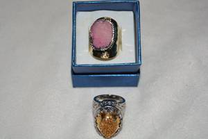 lot 618 image: (2) Polished Stainless Steel and rough cut Drusy rings. Both Size 9