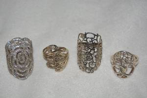 lot 610 image: (4) Sterling Silver filigree rings. All marked 925.  All size 9