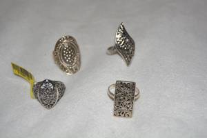 lot 619 image: (4) Sterling Silver filigree rings. All marked 925.  Sizes (2)-9, (2)-9.5