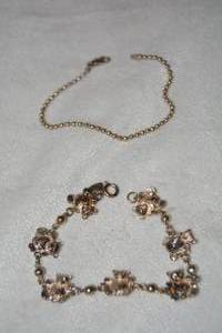 lot 605 image: (2) Sterling Silver bracelets. Teddy bear bracelet marked 925. Ball chain bracelet marked 925 Italy. Both 7L