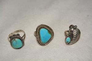 lot 600 image: (3) Sterling Silver Turquoise native American artisan rings. One marked GL and one marked Sterling. Sizes 8.5, 11.5, 12