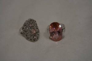 lot 615 image: (2) Sterling Silver Pink Quartz rings. Both marked 925. Size 8.5, 9