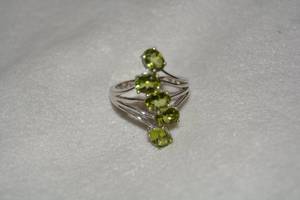 lot 623 image: Sterling Silver Iolite spray ring. Iolite tested. Marked 925. Gem tested. Size 9