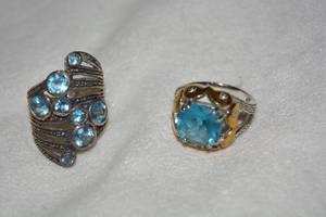 lot 626 image: (2) Sterling Silver and Blue Topaz rings. Blue Topaz tested. Both marked 925. Both size 9