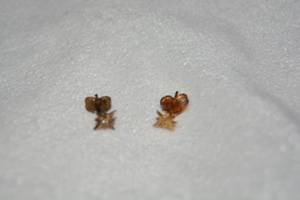 lot 642 image: Star earrings with simulated diamond and 14K yellow gold butterfly backs