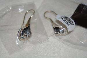 lot 640 image: Sterling Silver Orchid drop Earrings. Marked 925. About 1.25L
