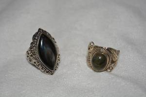 lot 639 image: (2) Sterling Silver Labradorite rings. Marked 925. Both size 9.