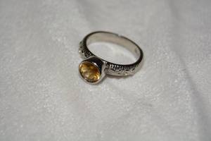lot 635 image: Sterling Silver Citrine ring. Marked 925. Citrine tested. Size 9