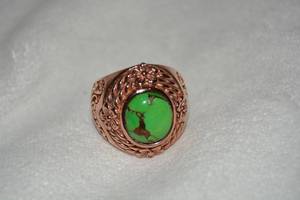 lot 643 image: Rose gold plated or vermeil (gold over sterling) Mohave green Turquoise Ring. Has marks but hard to read. Size 9