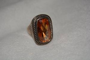 lot 636 image: Sterling Silver large faceted cushion cut Tourmaline ring with rope border. Marked 925. Size 9.5
