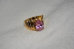 lot 653 image: Sterling Silver Vermeil (gold over silver) Pink Quartz pear shape ring. Marked 925. Size 9