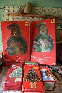 lot 501 image: Christmas Light-Up Decorations Twinkling Penguins, Fiber Optic Trees, and Solar Light Flag