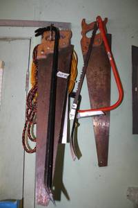 lot 457 image: Vintage Saws, Bow Saw , Crow Bars, and rope