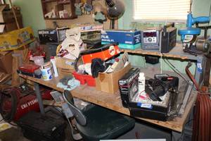 lot 463 image: Work bench with chair  has air line and electrical  Multi outlet (CONTENTS NOT INCLUDED) PLEASE PICKUP LATE SATURDAY OR SUNDAY