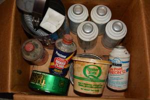 lot 659 image: Automotive Freon, Brake Fluid, Turtle Wax, Wheel Bearing Lubricant