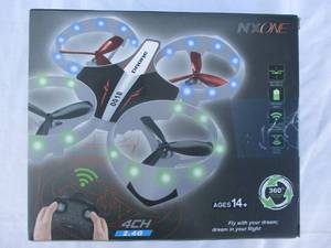 lot 25 image: NEW-NX-ONE Blue Remote Control Quadcopter Drone With Dazzle Lights