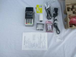 lot 18 image: First Data-FD410, Portable Credit Card Terminal- Looks Unused