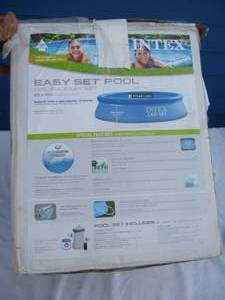 lot 21 image: Open Box- Intex 8-Ft Round x 2-Ft High Easy Set Above Ground Pool- Looks Complete And Never Used