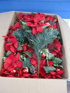 lot 41 image: About 12- Red Magnolia Holiday Floral Bouquets. Note X the Money