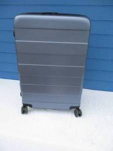 lot 48 image: Large 29- Floor Model, Blue Hard side Expandable Suitcase On Casters With TSA Lock