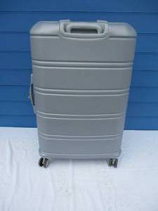 lot 71 image: Large 29- Floor Model, American Tourister, Gray Hard side Expandable Suitcase On Casters, TSA Lock, About 29 x 20 x 12