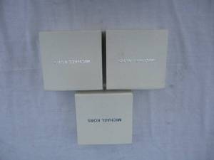 lot 75 image: 3-MICHAEL KORS - GIFT BOXES, EACH WITH DUST BAG AND JEWELRY CARE BOOK