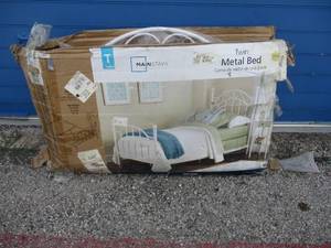 lot 81 image: MAINSTAYS- Twin Size, White Metal Bed Frame, Still In The Box, Looks Complete, No Mattress Included.