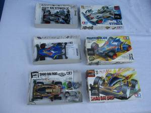 lot 86 image: 3-Super X Class-Mini 4-WD Series132 class Race Cars, Note 3 x Money