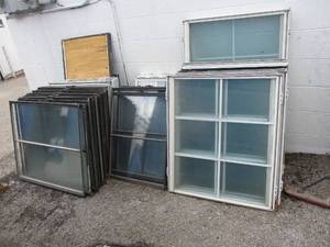 lot 92 image: LOT Of About 50- Mixed Sizes Of Window Panels  Panes  Sashes