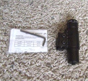 lot 104 image: Rail mount Laser site needs batteries