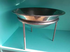 lot 21 image: Stainless Steele bowl and fire pit stand