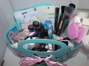 lot 26 image: Generous Make up lot, Complete in a Wrapped Gift Basket