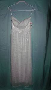 lot 44 image: $$ Beautiful White semi formal dress Perfect for prom or a wedding, size Medium. NEW WITH TAGS