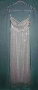lot 50 image: $$ Beautiful White semi formal dress Perfect for prom or a wedding, size Medium. NEW WITH TAGS