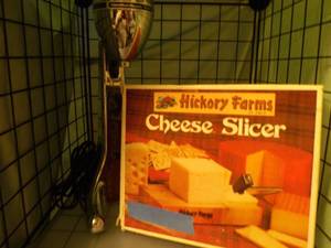 lot 62 image: Hamilton Beach Drink Mixer (pictured as shown) Vintage Hickory Farms Cheese cuttercutting Board (New)