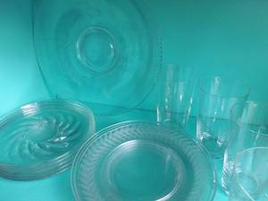 lot 111 image: Clear Glass plate and generous quantity of clear dessert plates etched and design  in style and size as shown. Four Javit Starburst drinking Glasses