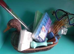 lot 52 image: Wicker Duck, Contents included