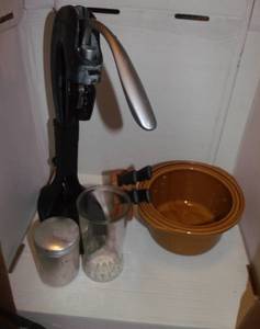 lot 61 image: Mixed Kitchen items, Countertop wine opener, insert for crockpot, butcher block of steak knives, saltshaker and old jelly jar glass