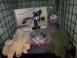 lot 68 image: Countertop wine opener, work gloves and other misc items pictured as shown
