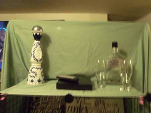lot 79 image: Empty Liquor Bottle Glasses and working DVD Player with remote