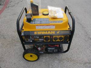 lot 2 image: Firman 10000 8000-Watt, Electric Start, Gas Generator With Remote. Note Missing Single Folding Handle. Works.