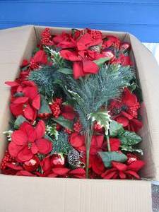 lot 52 image: About 12- Red Magnolia Holiday Floral Bouquets. Note  12 X The Money