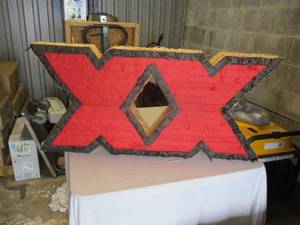 lot 63 image: Dos Equis XX- Double Sided Pinata  Hanging Sign