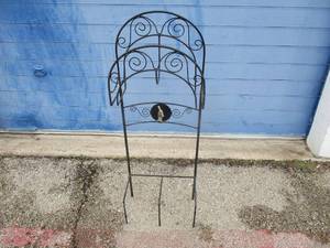 lot 65 image: Metal Garden  Yard Hose Hanger With Bottom Shelf, About 15 x 48 x 7-D