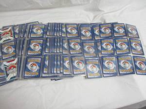 lot 85 image: 57-Protcitve Card Sleeve Pages of 9-Mixed PokeMon Cards Per Page (513-Cards)