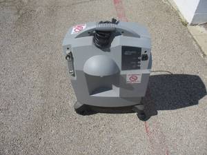 lot 80 image: MILLENNIUM Respironics, M600 Oxygen Concentrator, You could use it to make compressed oxygen for a oxy torch.