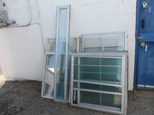 lot 112 image: LOT Of About 40- Mixed Sizes Of Window Panels  Panes  Sashes