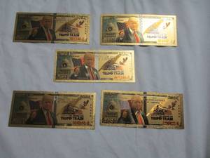 lot 44 image: 5- 2024- All Aboard The Trump Train, Novelty Gold Tone Bills, Note 5-X Money