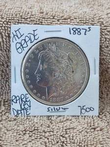 lot 125 image: 1887-S Morgan Silver Dollar