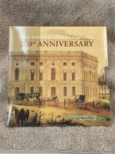 lot 136 image: The peoples coin - uncirculated commemorative clad half-dollar